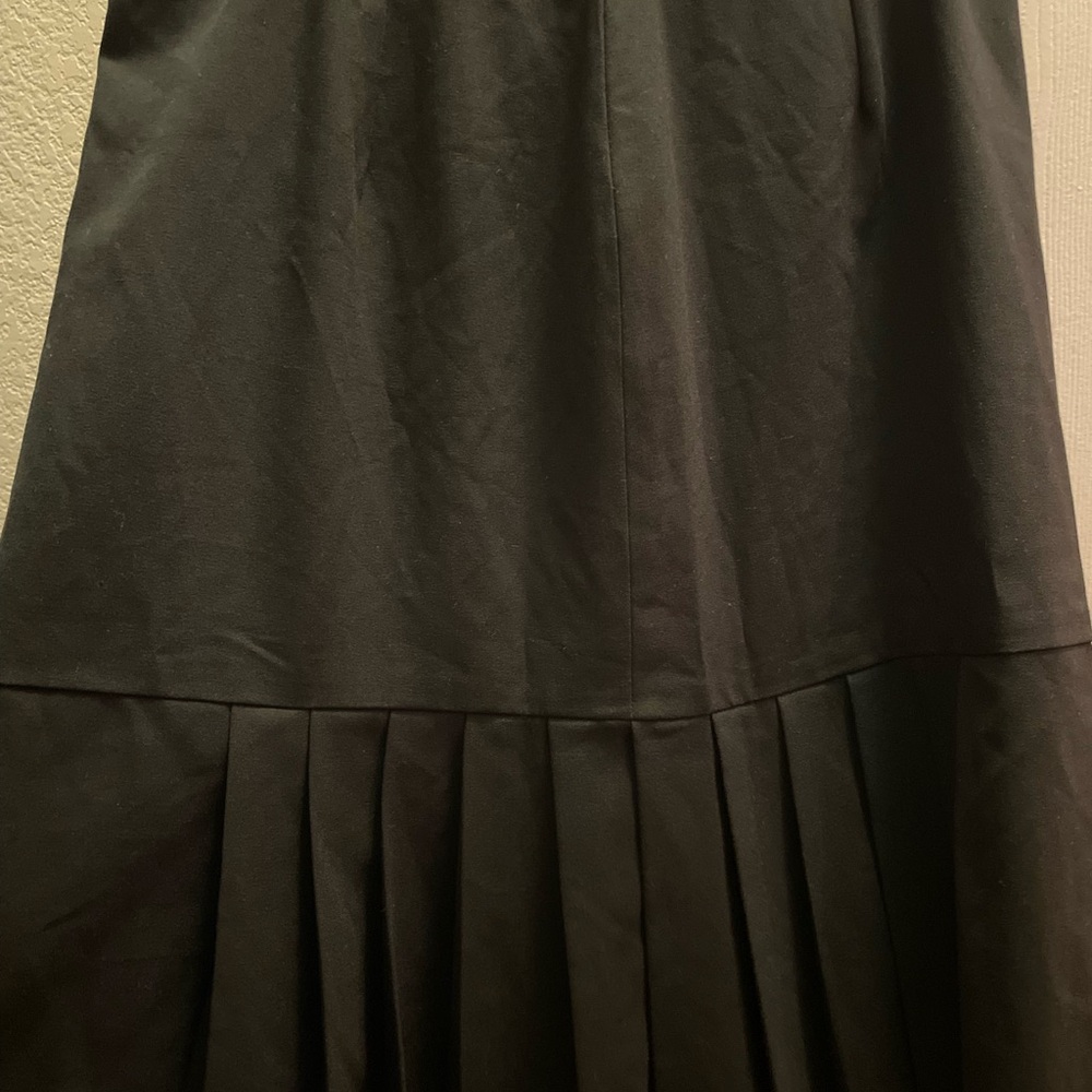 Requirements Classic Knee length pleated  skirt